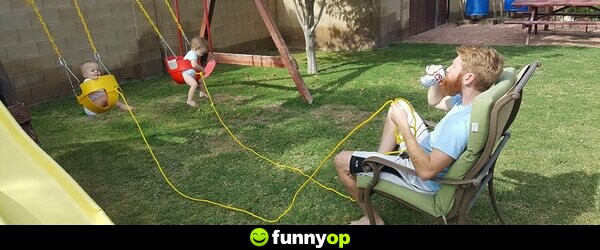 *dad using ropes to swing his kids*